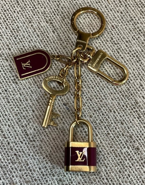Louis Vuitton Pre-love the brass keychain or bag charm